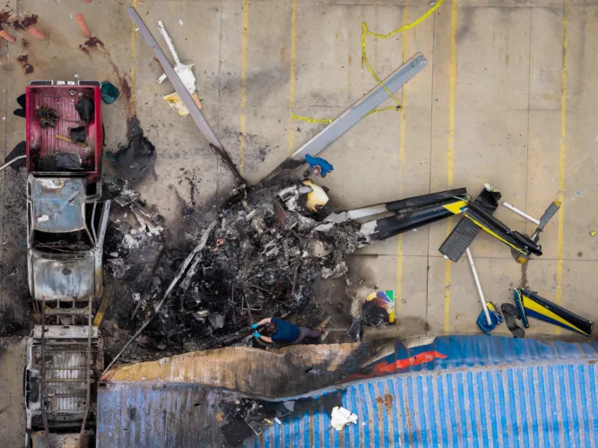 Driver who hit LA bus before news helicopter crash accused of murder